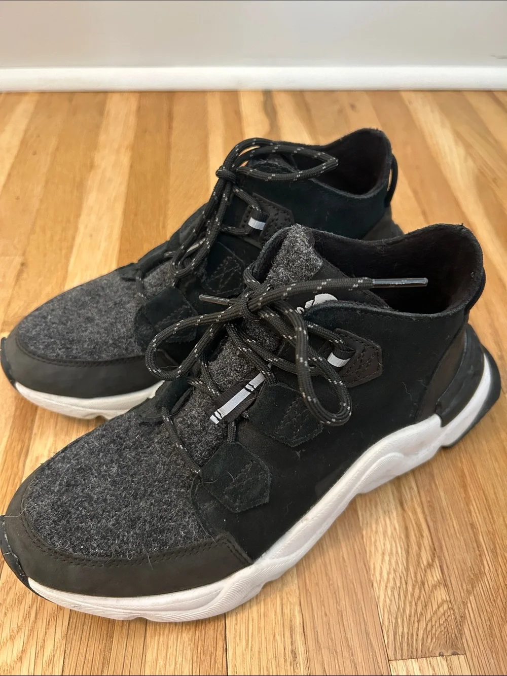 Sorel. Women’s Black Chunky Sneaker with White Sole.